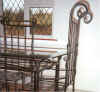 Wrought iron dining suite with scroll effects