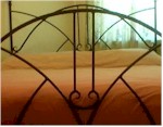 Head board and end board of a double size wrought iron bed
